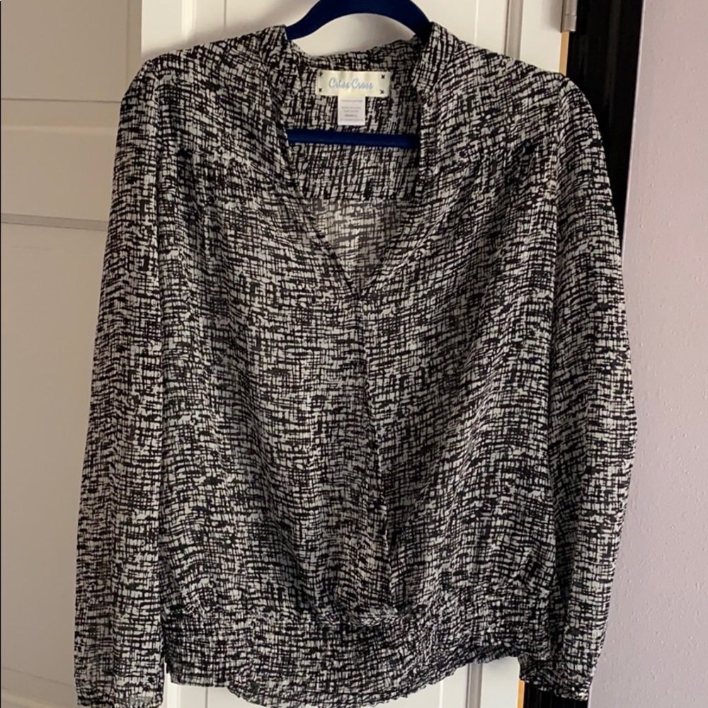 Criss Cross black/white print blouse.